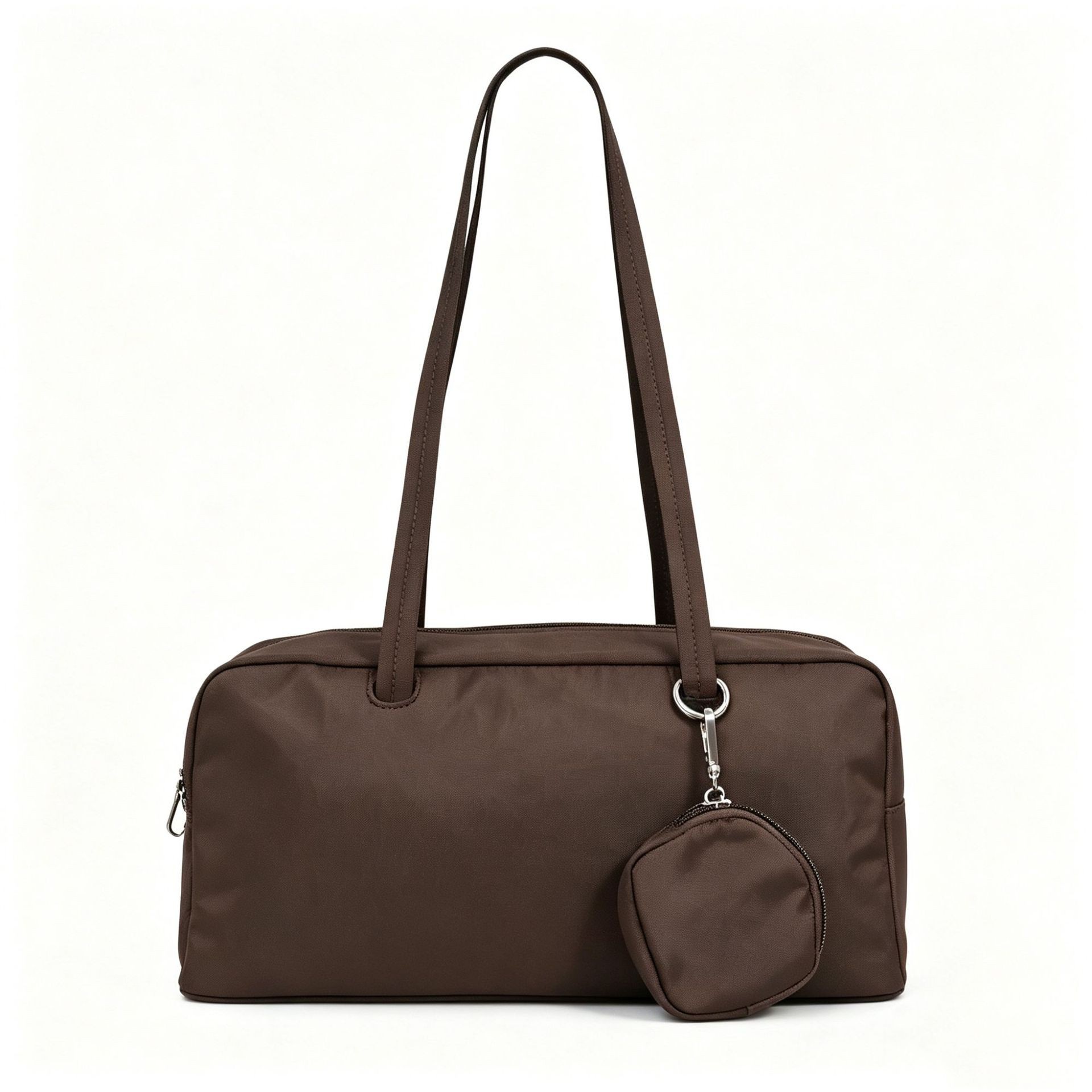Lightweight nylon duffle shoulder tote bag with detachable small coin pouch. Available in solid colors and polka dot patterns