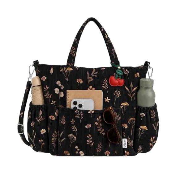 Large corduroy tote bag with side water bottle pockets, available in floral, botanical and plaid patterns.